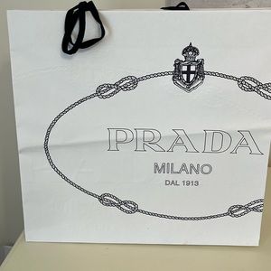 Prada shopping bag with Prada ribbon. Straight from store in Milan.
